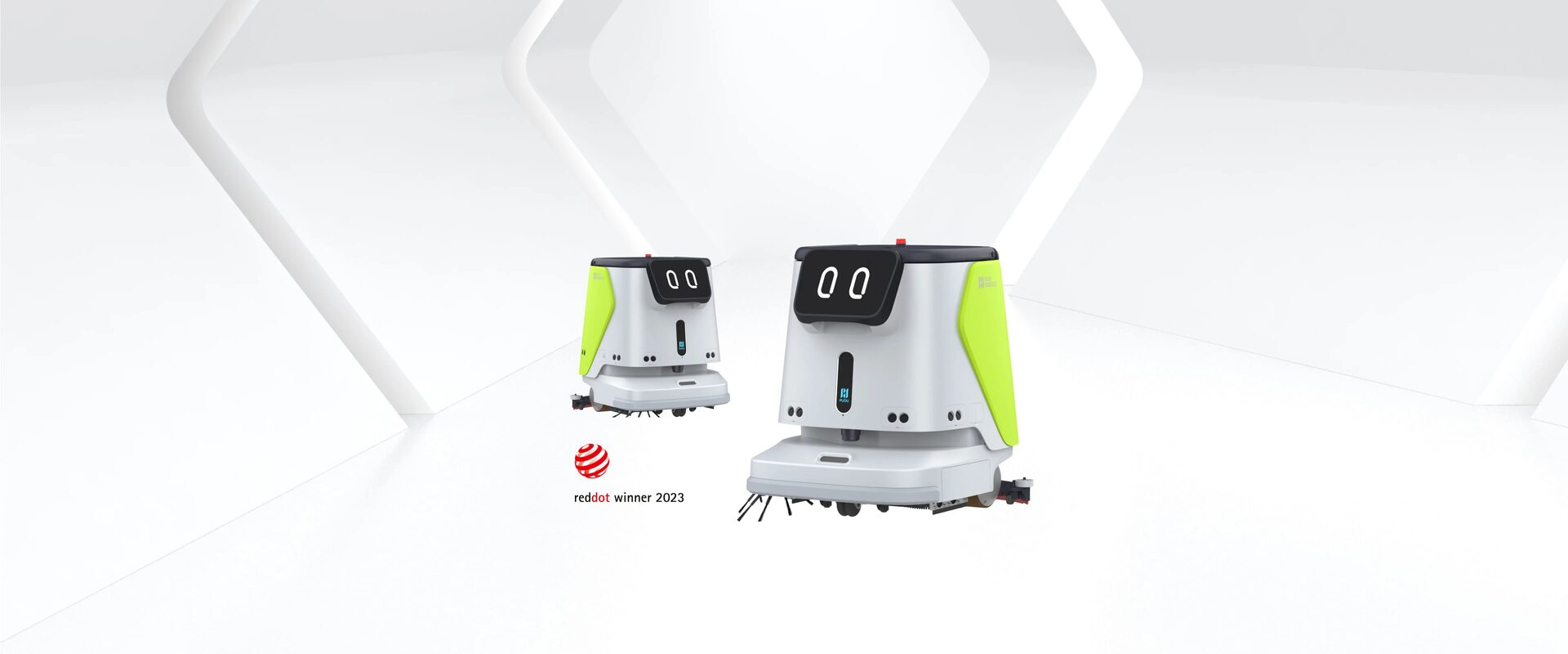 Deux autolaveuses autonomes PUDU CC1, blanches et vert anis, dans un décor de studio blanc.